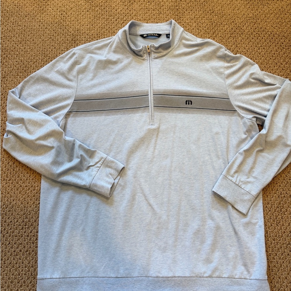Travis Matthew soft blue quarter zip pullover